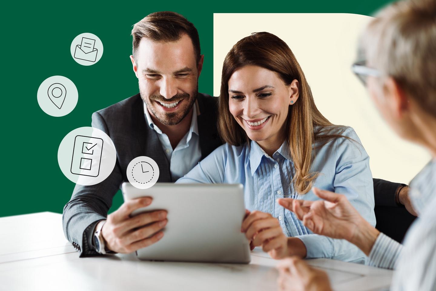 Couple looking at a tablet together